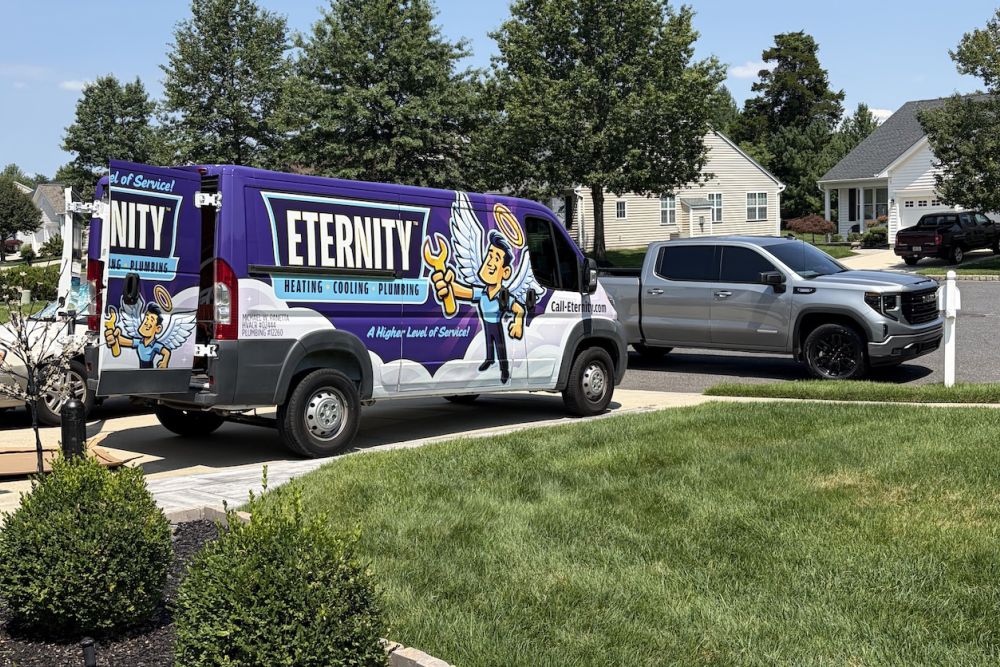 Eternity HVAC service van parked in suburban neighborhood driveway on a sunny day.